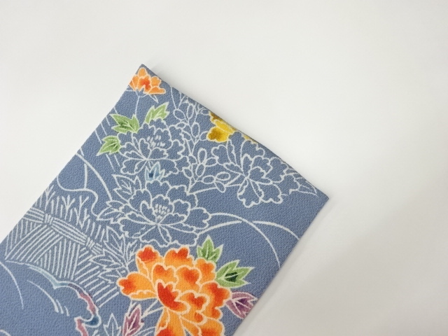  縮緬地柴垣に流水・草花模様名古屋帯